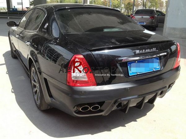 2004-2012 QUATTROPORTE WALD STYLE REAR BUMPER WITH REFLECTOR